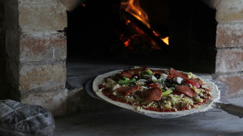 Classic Marco's pizza with mozzarella and tomato